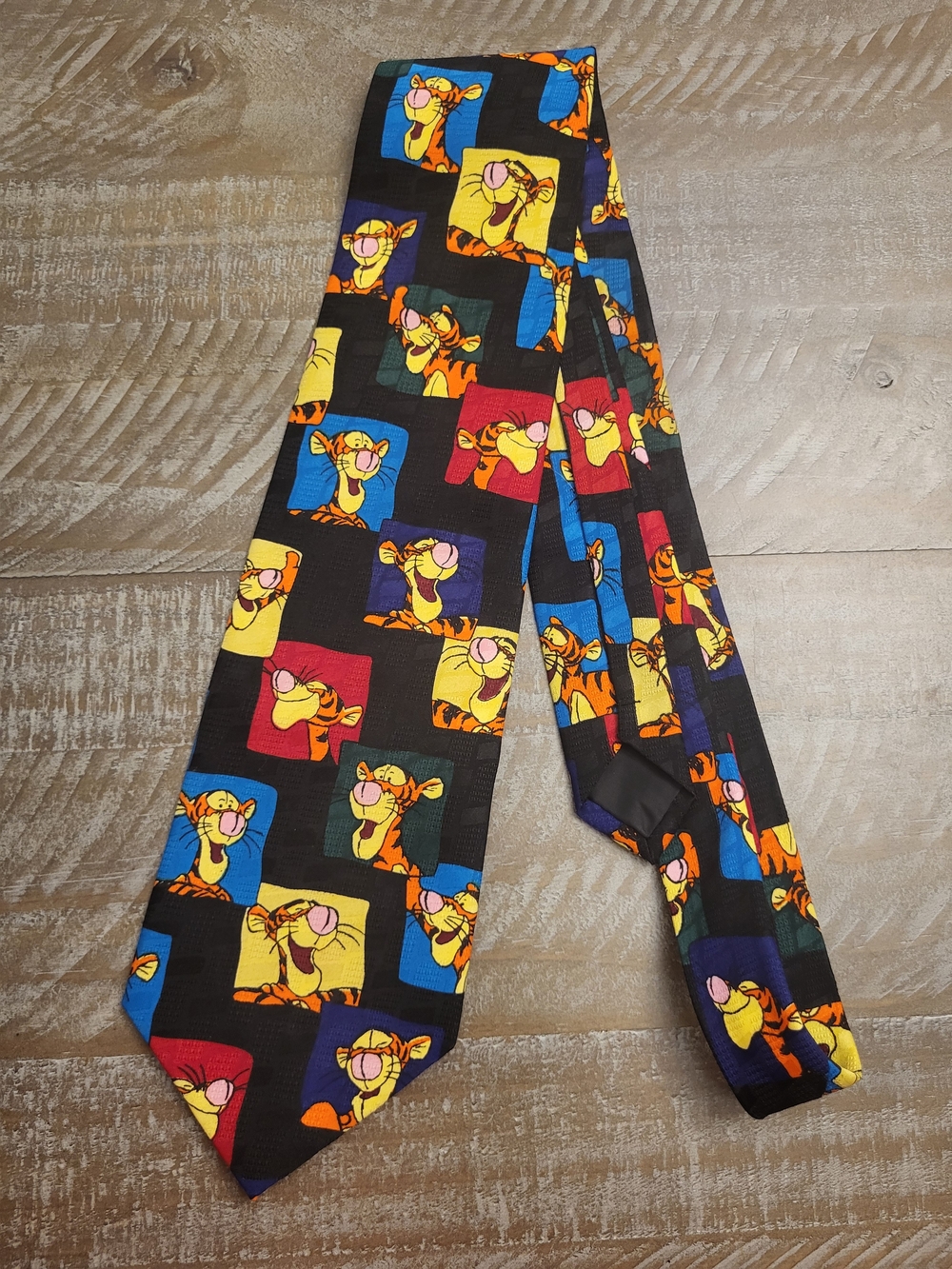 Disney Black Tigger Novelty Men's Tie with Red, Yellow, Blue Squares